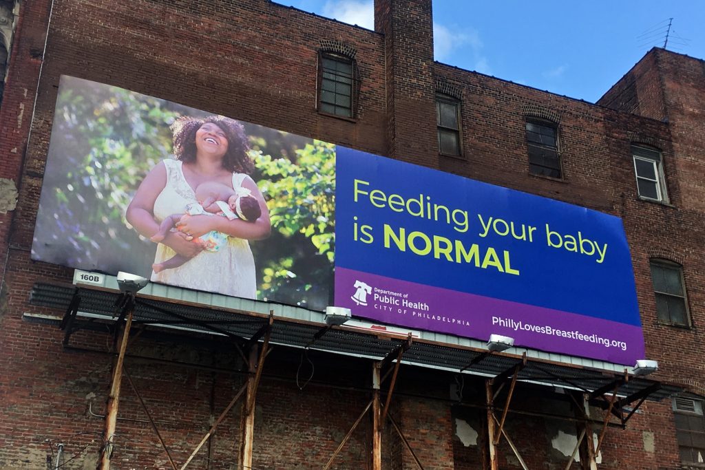 2018 08 23-e lee-philadelphia callowhill street-breastfeeding billboard A billboard on Callowhill Street is part of Philadelphia's campaign in support of breastfeeding features a photo taken by Vanessa A. Simmons of a city woman. (Emma Lee/WHYY)