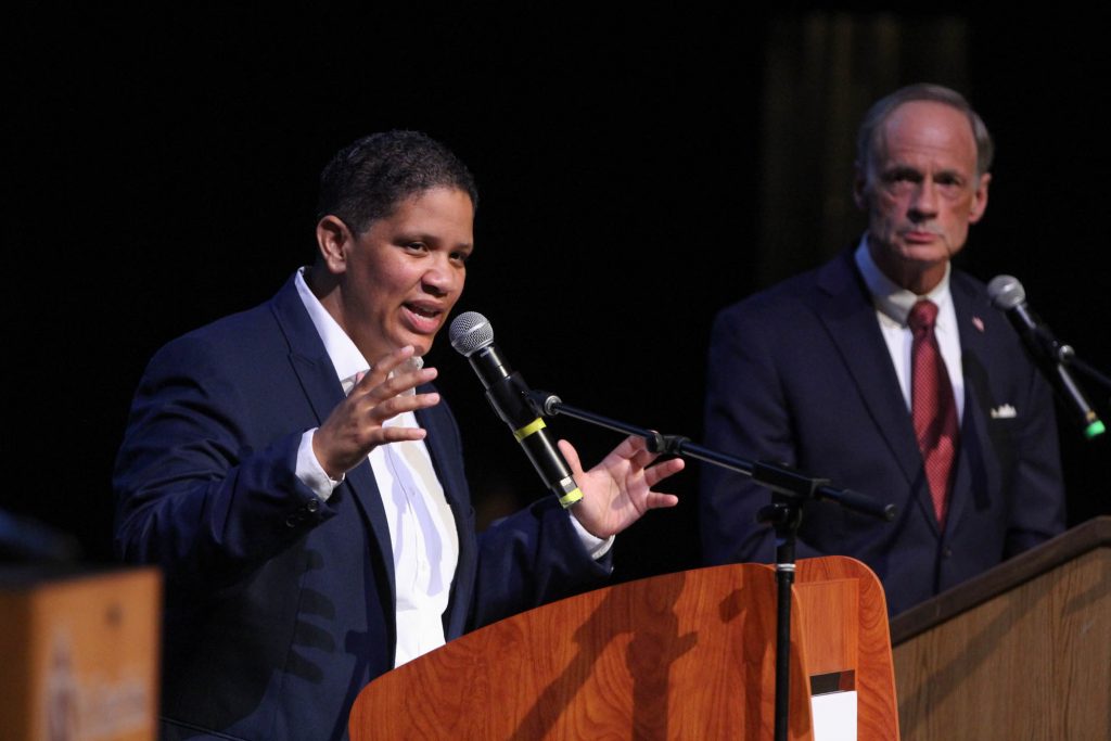 2018 08 27-e lee-wilmington-democrat senate debate Incumbent U.S. Sen. Tom Carper (right) and challenger for the Democratic nomination, Kerri Evelyn Harris, debate at the Cab Calloway School for the Arts in Wilmington.