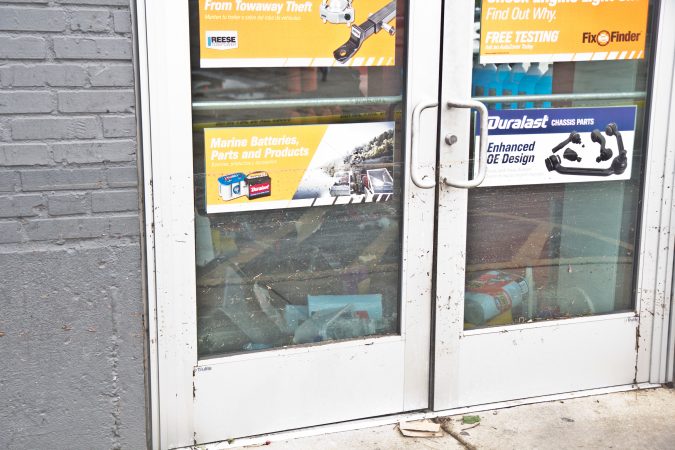 A flash flood caused destruction at the Auto Zone on Marshall road in Upper Darby. (Kimberly Paynter/WHYY)