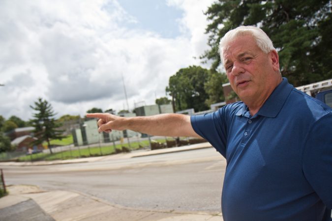Upper Darby Township Mayor Tom Micozzie explains how the flood raced down Long Lane. (Kimberly Paynter/WHYY)
