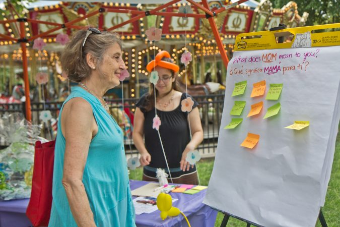 The Big Latch breastfeeding event at Franklin Square Park in Philadelphia offered resources to mothers. (Kimberly Paynter/WHYY)