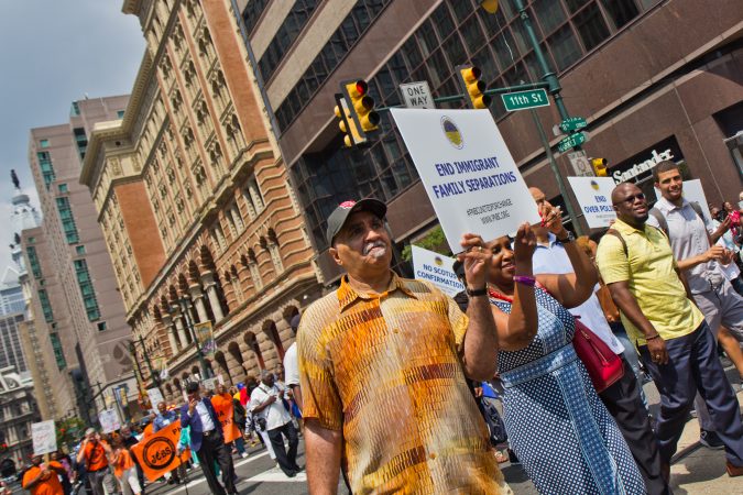 Members of the Progressive National Baptist Convention march for justice on Market Street in Philadelphia. (Kimberly Paynter/WHYY)