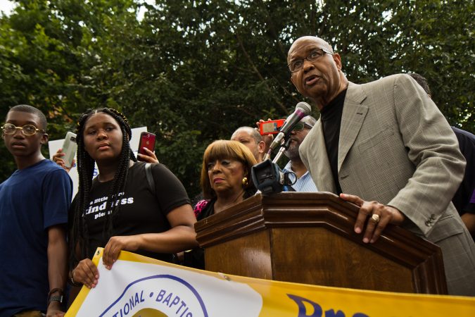 Progressive National Baptist Convention president Rev. James C. Perkins speaks on Independence Mall in Philadelphia Monday. (Kimberly Paynter/WHYY)