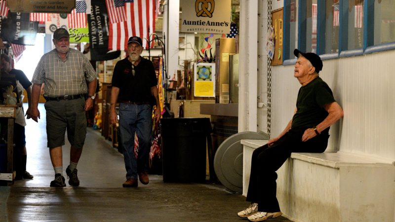 Shoppers walk the aisles at Zern's Farmers Market in Gilbertsville, Pa., on Aug. 24, 2018. (Bastiaan Slabbers for WHYY)