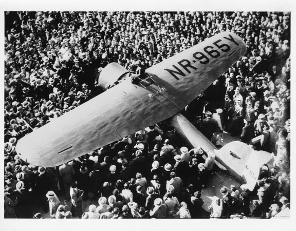 By 1935, crowds surged around Earhart wherever she went, including this landing in Oakland.