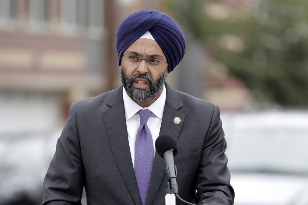 Pollution Lawsuits New Jersey Attorney General Gurbir Grewal speaks during a news conference, Wednesday, Aug. 1, 2018, in Newark, N.J. (AP Photo/Julio Cortez)