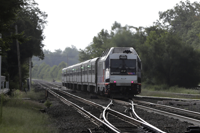File photo: A New Jersey Transit train leaves the Bound Brook Station, Friday, Aug. 3, 2018, in Bound Brook, N.J. (AP Photo/Julio Cortez)