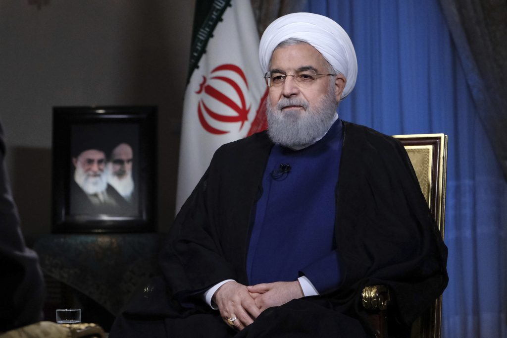 Iran Sanctions cyber Threat In this photo released by official website of the office of the Iranian Presidency, President Hassan Rouhani addresses the nation in a televised speech in Tehran, Iran, Monday Aug. 6, 2018. The U.S. is bracing for cyberattacks Tehran could launch in retaliation for sanctions President Donald Trump has slapped back on Iran, cybersecurity and intelligence experts warn (Iranian Presidency Office via AP)
