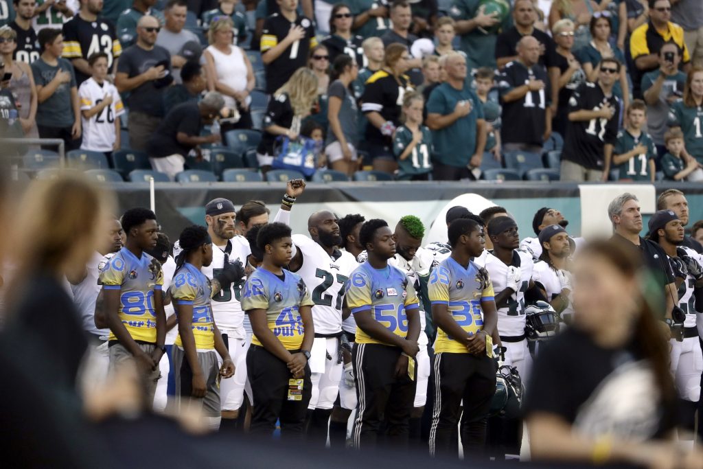 Malcolm Jenkins Philadelphia Eagles' Malcolm Jenkins, center left, raises his fist during the national anthem before the team's preseason NFL football game against the Pittsburgh Steelers, Thursday in Philadelphia. (AP Photo/Matt Rourke)