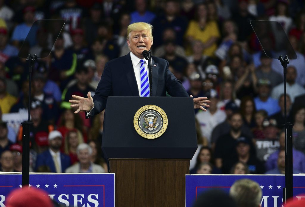 Trump President Donald Trump speaks during a rally Tuesday, Aug. 21, 2018, at the Civic Center in Charleston W.Va. (AP Photo/Tyler Evert)