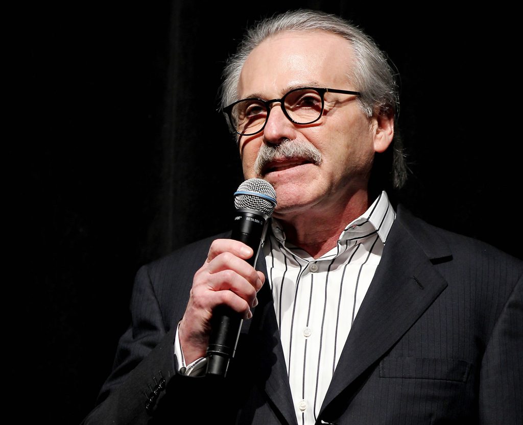 David Pecker, Shape & Men’s Fitness Super Bowl Party, New York, America – 31 Jan 2014 In this Jan. 31, 2014 photo, David Pecker, Chairman and CEO of American Media, addresses those attending the Shape & Men's Fitness Super Bowl Party in New York. The Aug. 21, 2018 plea deal reached by Donald Trump's former attorney Michael Cohen has laid bare a relationship between the president and Pecker, whose company publishes the National Enquirer. Besides detailing tabloid's involvement in payoffs to porn star Stormy Daniels and Playboy Playmate Karen McDougal to keep quiet about alleged affairs with Trump, court papers showed how David Pecker, a longtime friend of the president, offered to help Trump stave off negative stories during the 2016 campaign. (Marion Curtis via AP)
