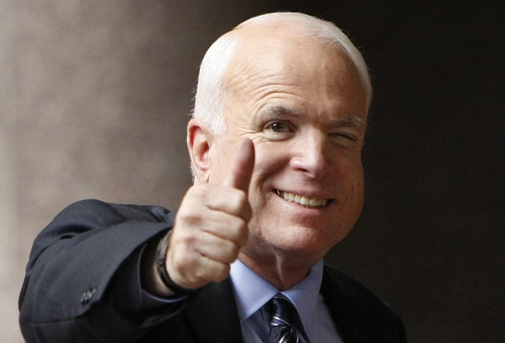 John McCain In this Sept. 28, 2008 file photo, Republican presidential candidate, Sen. John McCain, R-Ariz., gives a thumbs up as he arrives at his campaign headquarters in Arlington, Va. McCain’s family says the Arizona senator has chosen to discontinue medical treatment for brain cancer. (Gerald Herbert/AP Photo)