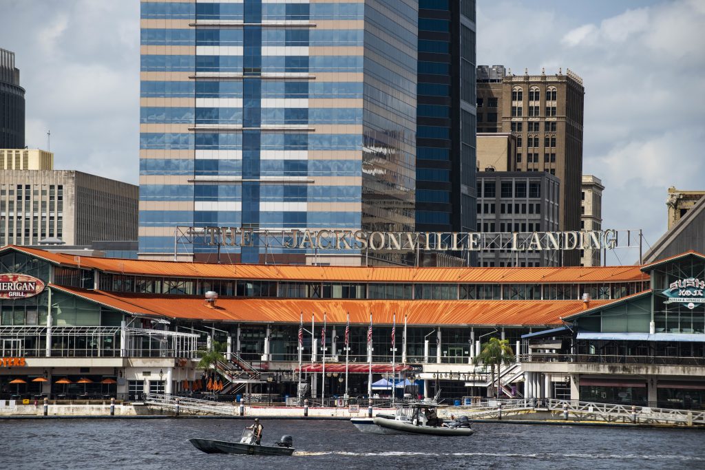 APTOPIX Mall Shooting Florida The Coast Guard patrols the St. Johns River outside The Jacksonville Landing in Jacksonville, Fla., Sunday, Aug. 26, 2018. Florida authorities are reporting multiple fatalities after a mass shooting at the riverfront mall that was hosting a video game tournament. (AP Photo/Laura Heald)