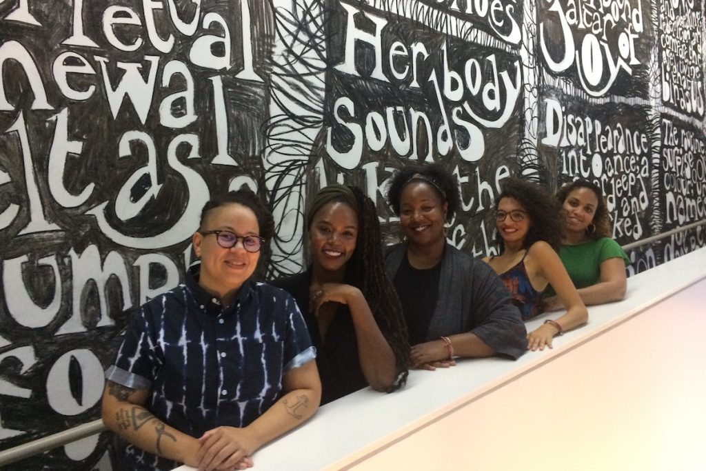 Blackstar_JKinney Blackstar organizers Meg Onli, Patrice Worthy, Maori Karmael Homes, Nehad Khader, and Denise Beek in front of an artwork by Jade Montserrat at the Institute for Contemporary Art. Blackstar highlights the work of black filmmakers from around the world. (Credit: Jen Kinney)
