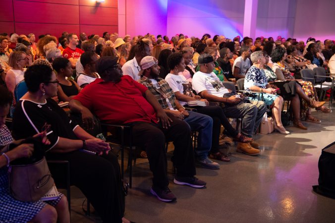 Audience members listen during an event at WHYY to celebrate the publishing of 