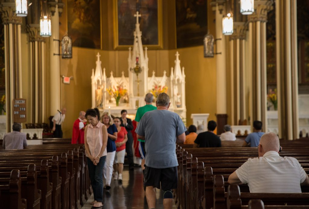 Holy Infancy Roman Catholic Bethlehem PA 08142018_01 Parishioners receive communion at Holy Infancy Roman Catholic in Bethlehem, Pennsylvania, part of the Allentown Diocese. (Lindsay Lazarski/WHYY)