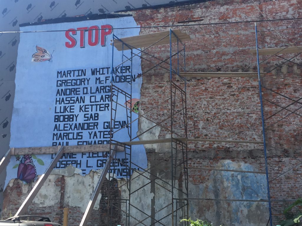 IMG_4431 Developer Steven Brown, who said his intention had always been to preserve the mural, said the building was on the verge of collapse and impossible to save. He has promised to replace it. (Annette John-Hall/WHYY)