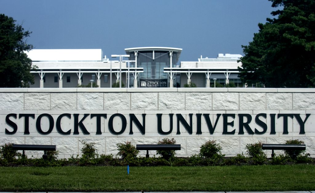 Stockton University, Galloway Township. campus. (Anthony Smedile for WHYY) a sign for Stockton University
