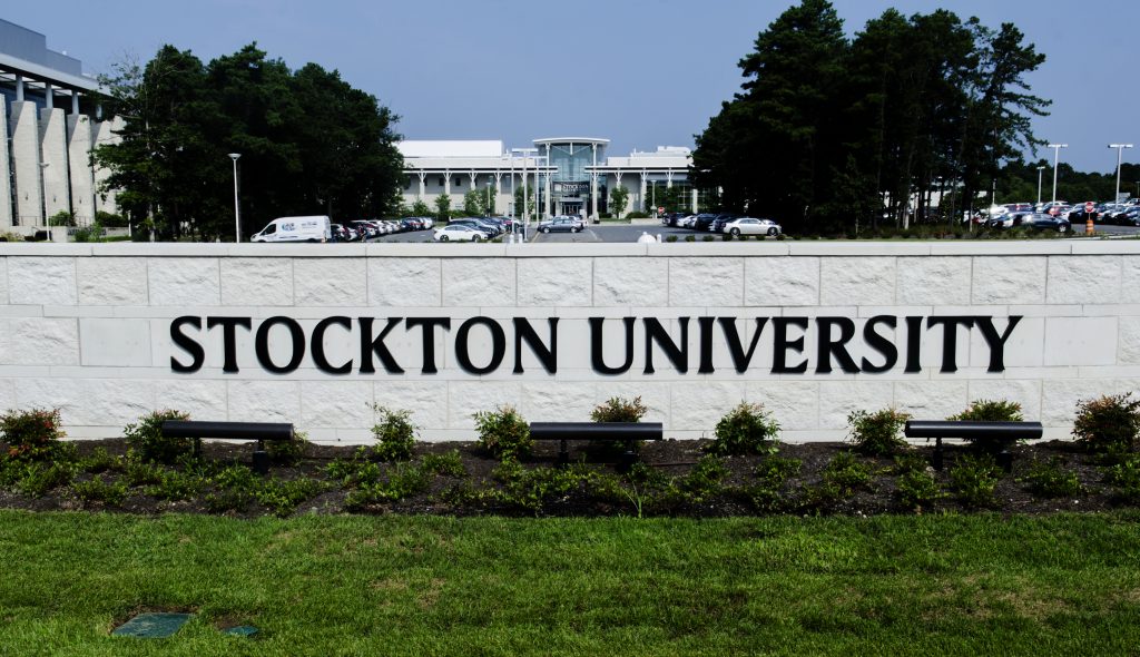 Stockton University, Galloway Township. campus. (Anthony Smedile for WHYY) a sign for Stockton University