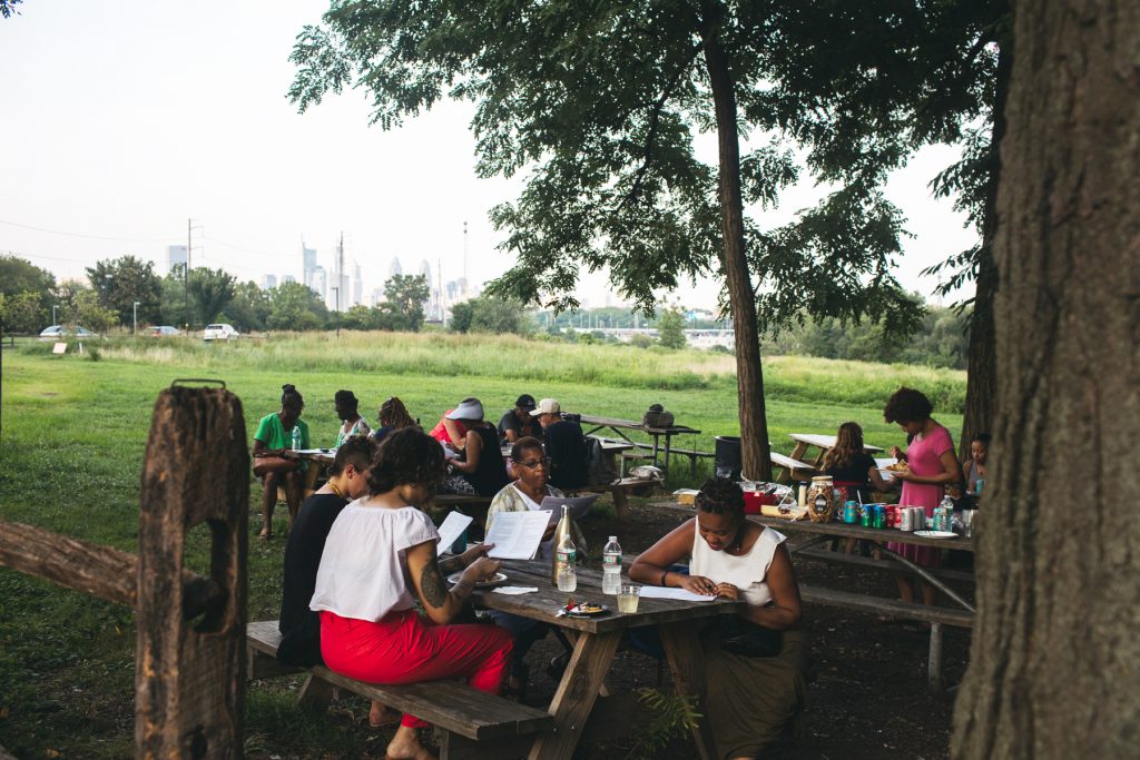 An event exploring the outdoor world in black literature in the picnic grove at Bartram's Garden was organized by the Free Library's Center for Public Life. | Neal Santos for PlanPhilly