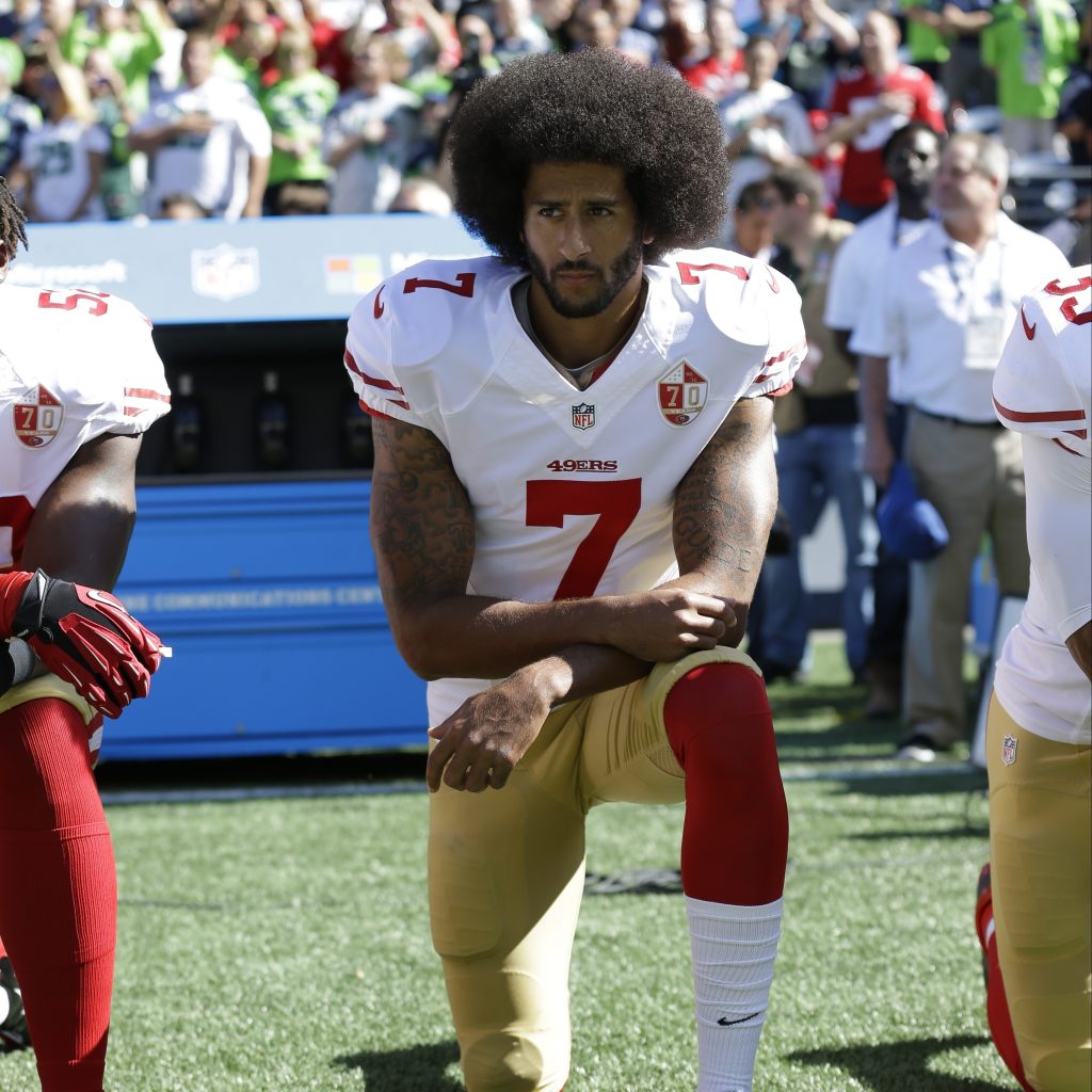 San Francisco 49ers’ Colin Kaepernick kneels during the national anthem before an NFL football game against the Seattle Seahawks, in Seattle, in September 2016. San Francisco 49ers' Colin Kaepernick kneels during the national anthem before an NFL football game against the Seattle Seahawks, in Seattle, in September 2016. (Ted S. Warren/AP)