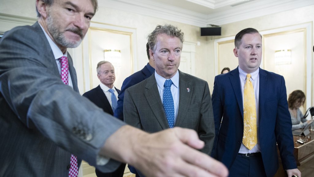 Sen. Rand Paul, center, and his communications director Sergio Gor, right, enter a hall during their meeting with Russian lawmakers in Moscow Monday. Sen. Rand Paul, center, and his communications director Sergio Gor, right, enter a hall during their meeting with Russian lawmakers in Moscow Monday. (Pavel Golovkin/AP)