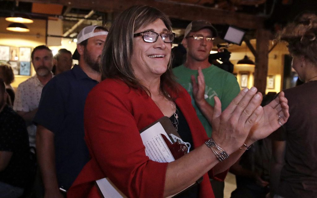 Vermont Democratic gubernatorial nominee Christine Hallquist, a transgender woman and former electric company executive, applauds with her supporters during her election night party in Burlington, Vt. Vermont Democratic gubernatorial nominee Christine Hallquist, a transgender woman and former electric company executive, applauds with her supporters during her election night party in Burlington, Vt.