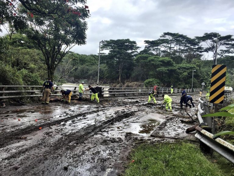 Crews on Friday worked at clearing damage from Hurricane Lane near Hilo, Hawaii. The hurricane dumped torrential rains which inundated the Big Island's main city. (Crews on Friday worked at clearing damage from Hurricane Lane near Hilo, Hawaii. The hurricane dumped torrential rains which inundated the Big Island's main city. (Crews on Friday worked at clearing damage from Hurricane Lane near Hilo, Hawaii. The hurricane dumped torrential rains which inundated the Big Island's main city. (Crews on Friday worked at clearing damage from Hurricane Lane near Hilo, Hawaii. The hurricane dumped torrential rains which inundated the Big Island's main city. (Jessica Henricks)