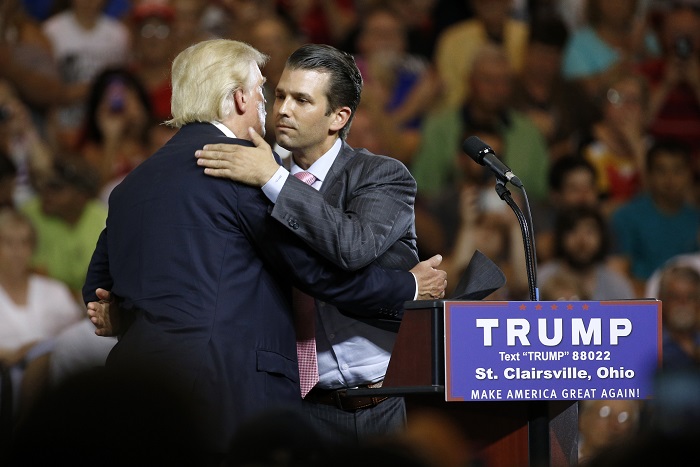 Donald Trump, Donald Trump Jr Republican presidential candidate Donald Trump, left, hugs his son Donald Trump Jr. during a rally at Ohio University Eastern Campus in St. Clairsville, Ohio, Tuesday, June 28, 2016. (AP Photo/Patrick Semansky)