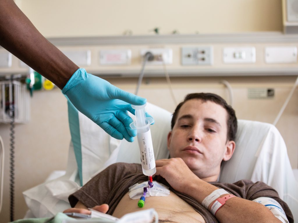 Patient Aaron Reid receives (CAR) T-cell therapy at the NIH in Bethesda, MD. The process took five minutes to complete. Patient Aaron Reid receives (CAR) T-cell therapy at the NIH in Bethesda, MD. The process took five minutes to complete. (Pearl Mak/NPR)