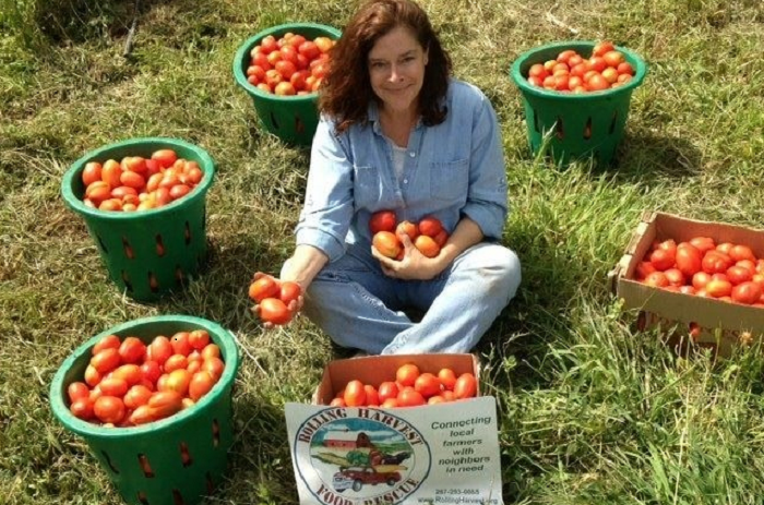 Rolling Harvest Food Rescue Founder and Executive Director Cathy Snyder in her element.
