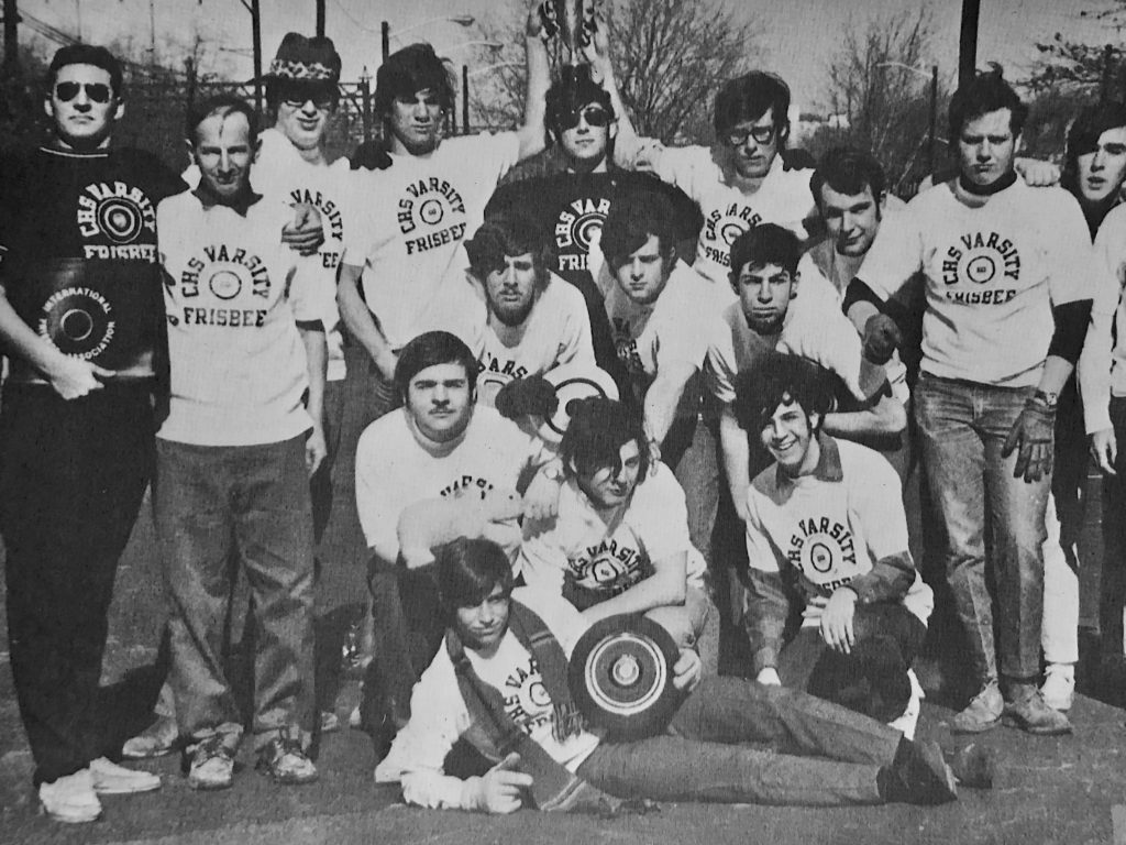 Joel Silver is far left in the black t-shirt and sunglasses. And Buzzy Hellring is in the middle (under the cup) also in the black t-shirt and sunglasses.