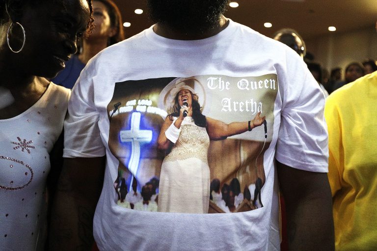 A man listens to Rev. Jesse Jackson speak Aug. 19 at New Bethel Baptist Church, the church where Aretha Franklin's late father Rev. C.L. Franklin was a minister and where she began her singing career. (Bill Pugliano/Getty Images)