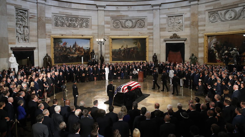 gettyimages-1028827134_wide-4a865f2ad8d4e9c51d3dd6a90a955bd22810dbc6-s800-c85 The flag-draped casket of Sen. John McCain arrives inside the Rotunda of the U.S. Capitol on Friday. (Drew Angerer/Getty Images)