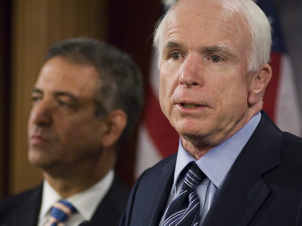 John McCain and Democrat Russ Feingold of Wisconsin co-sponsored a bill that became known as McCain-Feingold. After partnering with Democrat Russ Feingold of Wisconsin, John McCain worked alongside many others on what campaign finance reform should look like and how they might outmaneuver Senate Republican leaders who wanted to sink the legislation. (Scott J. Ferrell/Congressional Quarterly/Getty Images)