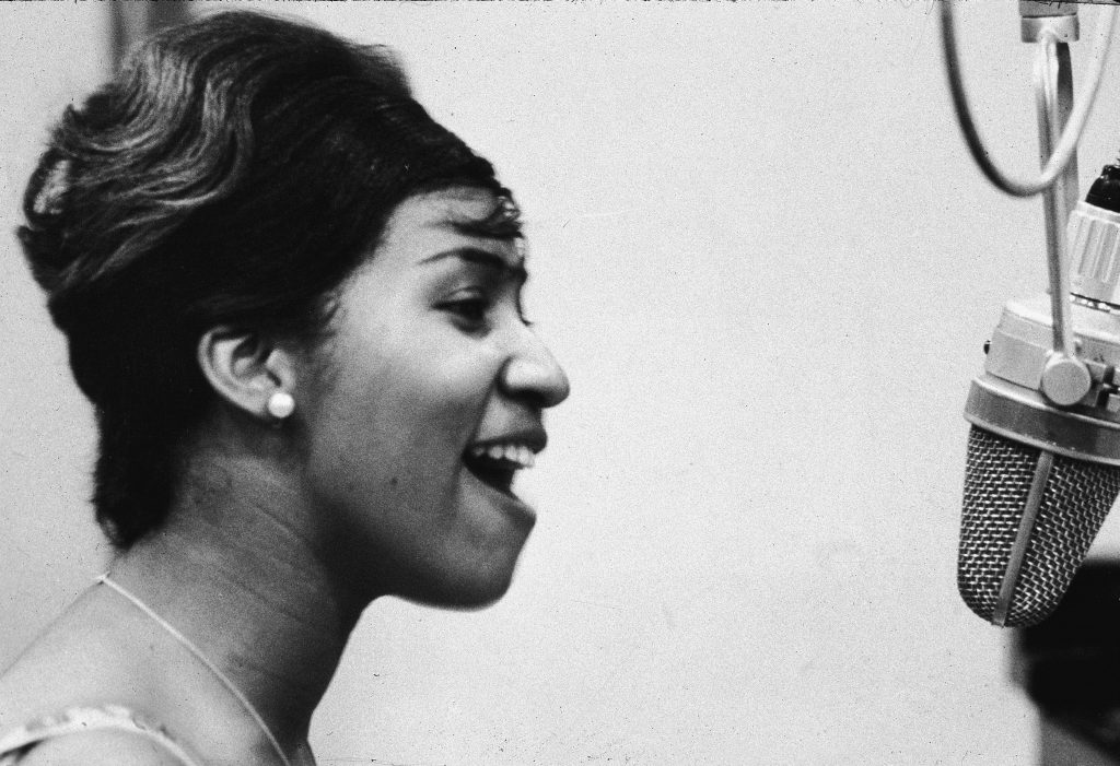 Aretha Franklin sings in the studio during during her early career at Columbia Records. Aretha Franklin sings in the studio during during her early career at Columbia Records. (Frank Driggs Collection/Getty Images)