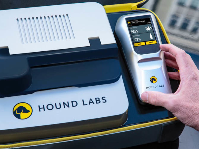 Hound Labs’ breathalyzer and base station. California Highway Patrol Sgt. Jaimi Kenyon blows into a alcohol breathalyzer during a demonstration of devices used to test drivers suspected of impaired driving May 2017, in Sacramento, Calif. Lawmakers and police are hoping new devices will be developed to effectively test for marijuana use by drivers. (Rich Pedroncelli/AP)