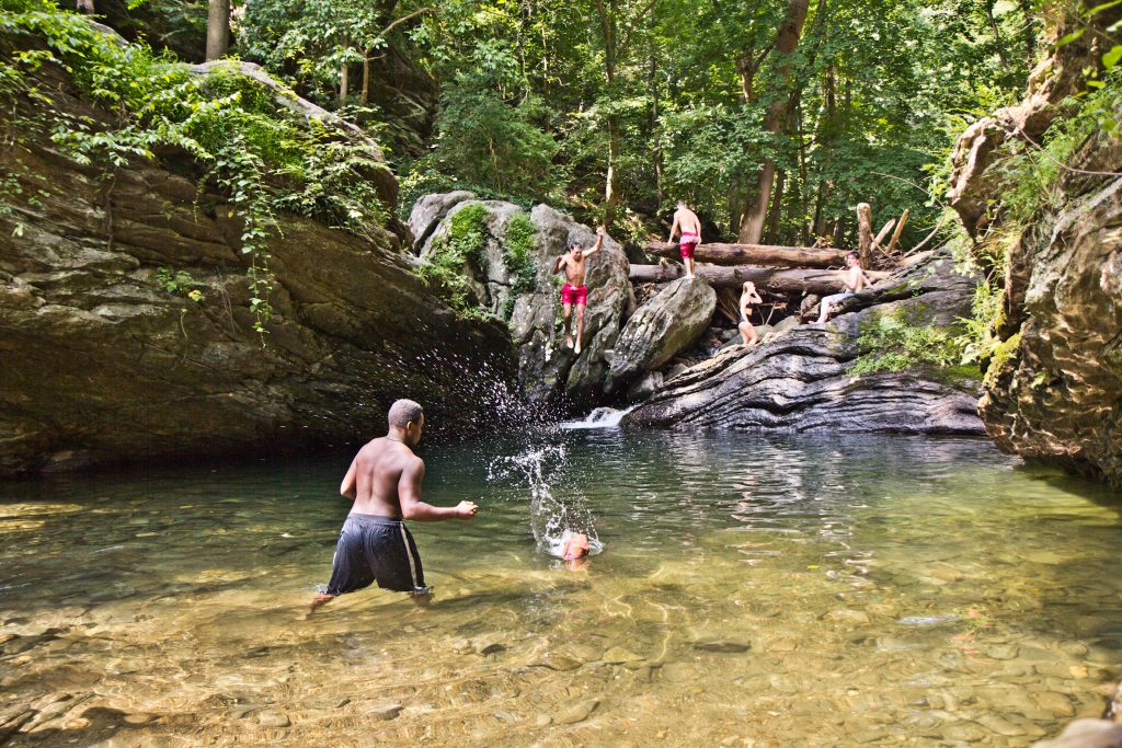 swimmers-cool-off-in-the-devil-s-pool-in-fairmount-park-in-philadelphia-kimberly-paynter-whyy.original Swimmers cool off in the Devil’s Pool in Fairmount Park in Philadelphia. (Kimberly Paynter/WHYY)
