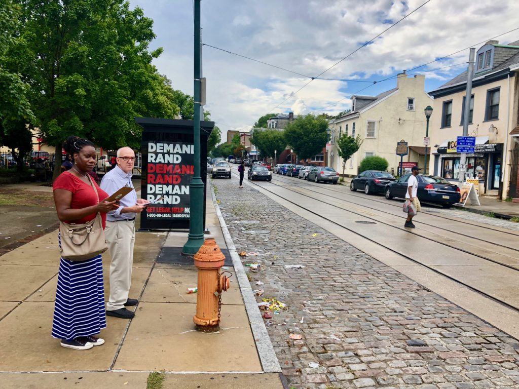 walkaudit.original Kelli McIntyre and Andy Trackman check out walking conditions along Germantown Avenue during a FeetFirstPhilly walk audit. (Meir Rinde/PlanPhilly)