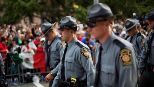 State police will now be required to make more visits to schools. (AP Photo)