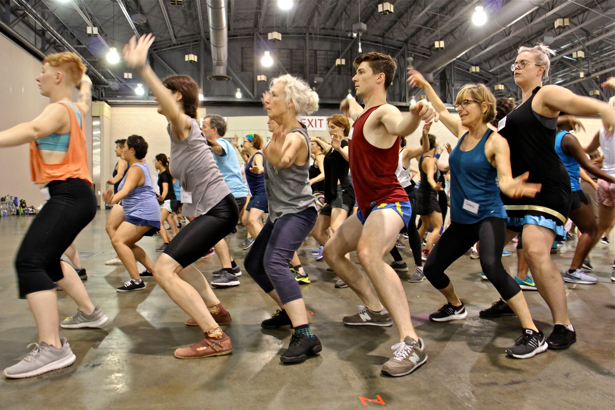 Virginia Hedges (third from left) and other volunteer dancers rehearse for their perfomance of "Le Grand Super Continental" on the steps of the Philadelphia Art Museum.