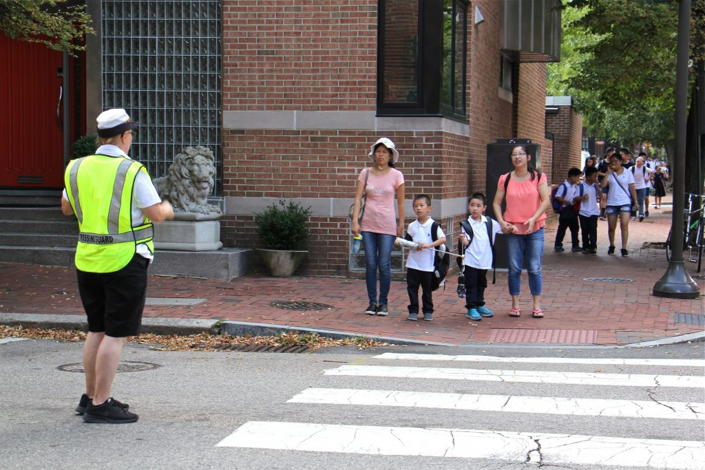2018 09 06-e lee-philadelphia mccall school-early release heat Students from McCall School in South Philadelphia walk home on Sept. 6, 2018. (Emma Lee/WHYY)