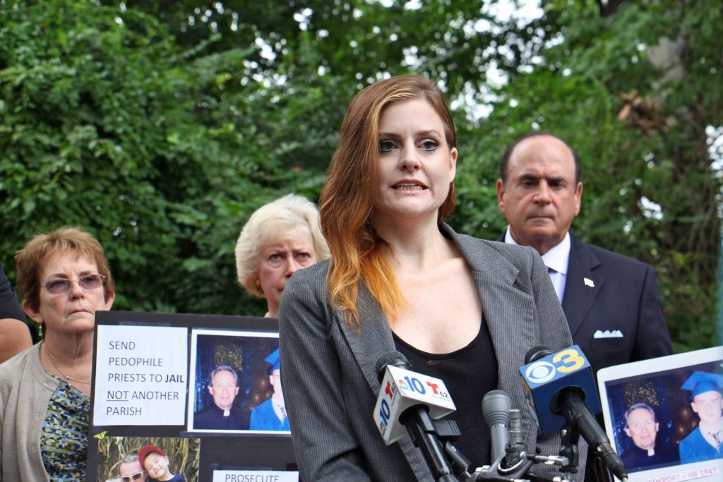 2018 09 11-e lee-king of prussia-child sex abuse statue of limitations Gymnast Jessica Howard, who was sexually abused by USA Gymnastics team doctor Larry Nassar, speaks on behalf of the victims of Catholic priests, urging Pennsylvania to adopt a law that would suspend the statute of limitations in claims of child sexual abuse. (Emma Lee/WHYY)