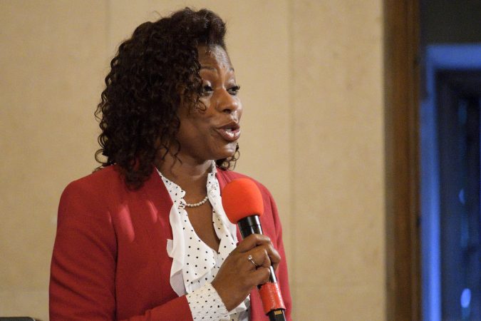 Girard College President, Dr. Heather Wathington welcomes attendees to the “Opening the Gates” forum about the desegregation of Girard College. (Bastiaan Slabbers for WHYY)