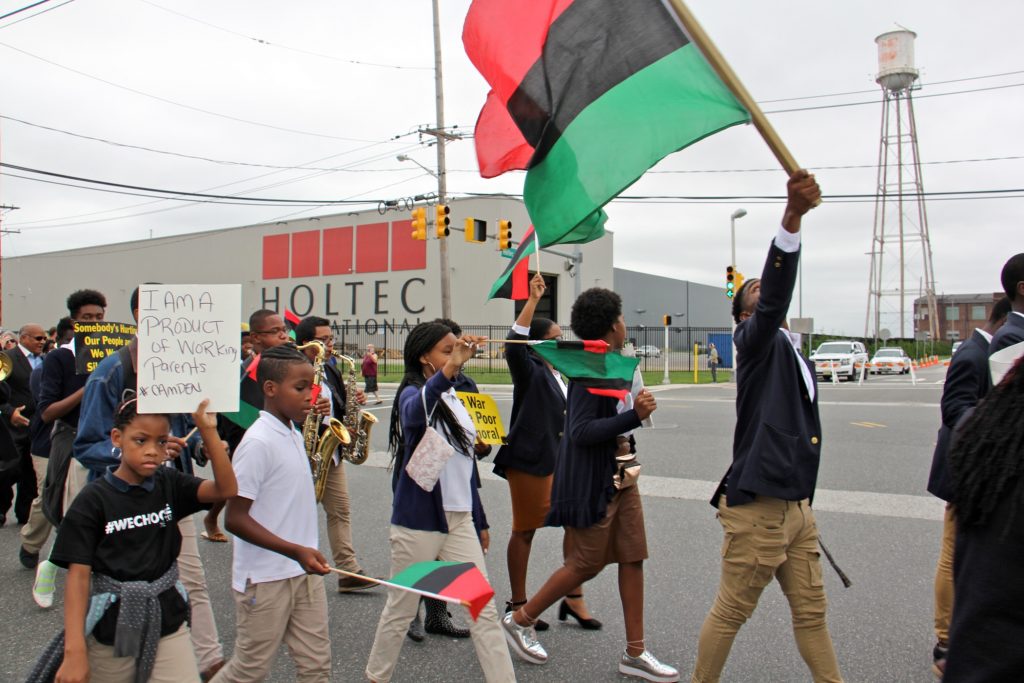 2018 09 14-e lee-camden-protest holtec Camden students march outside Holtec International, protesting remarks made by the company's CEO Krishna Singh that residents of the city don't know how to work. The company received $260 million in tax breaks to build its manufacturing plant in Camden. (Emma Lee/WHYY)