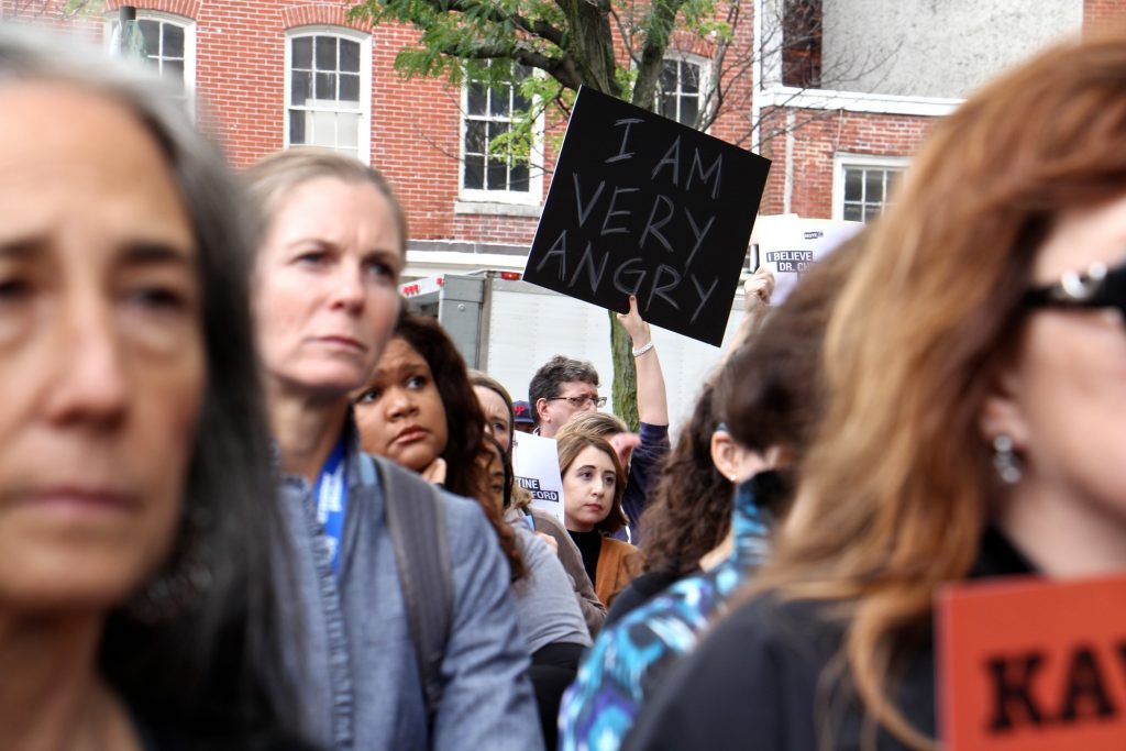 About 200 protesters gather outside the United States Custom House at 200 Chestnut Street to voice their objections to Brett Kavanaugh as a candidate for the U.S. Supreme Court in light of sexual assault allegations.
