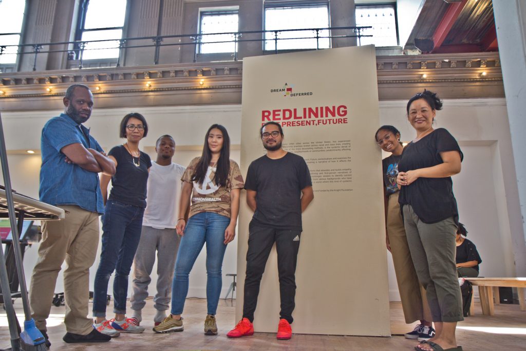 2018 9 19 k paynter dream deffered The Little Giant Creative Team during the setup of the Dream Deferred exhibit at 6th and Spring Garden Streets in Philadelphia. (Kimberly Paynter/WHYY)