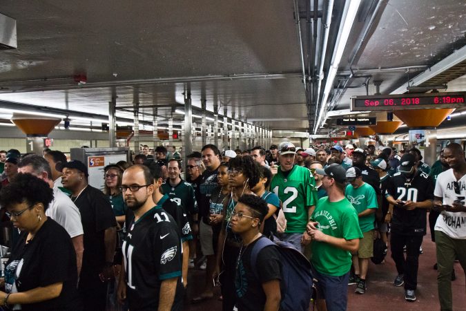 Eagles fans exit the subway and head to the season opener. (Kimberly Paynter/WHYY)