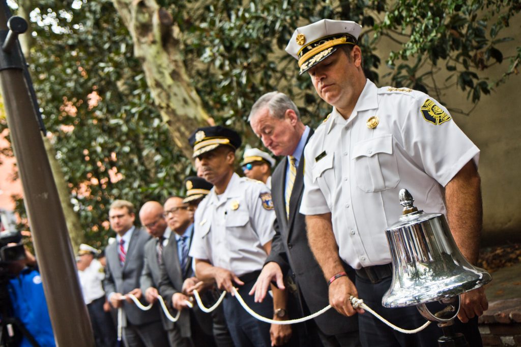 2018 9 8 k paynter 911 2018-4 City officials ring the bell in honor of those who lost their lives on September 11, 2001, and the first responders. (Kimberly Paynter/WHYY)