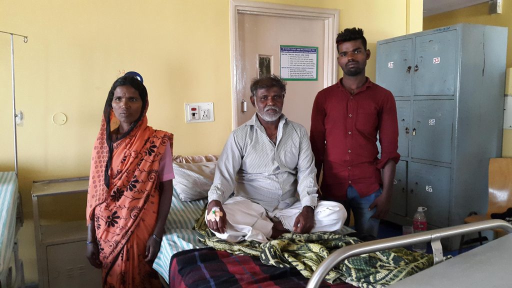 6 Sidlappa, who goes by one name, is 58 years old and waiting to get an angiogram. He traveled 8 hours to the hospital in Bangalore with his wife Ramlingamma and two of his seven children. (Mary-Rose Abraham)